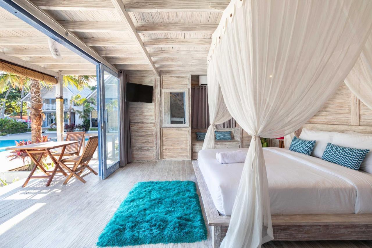 Апарт отель Seminyak Beach Hut Экстерьер фото