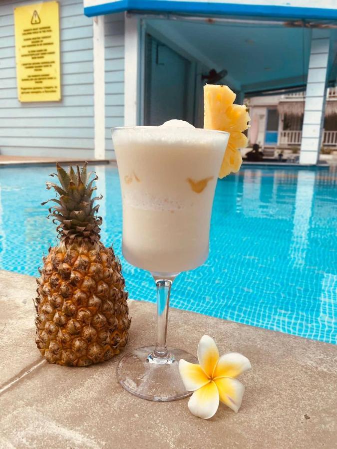 Апарт отель Seminyak Beach Hut Экстерьер фото